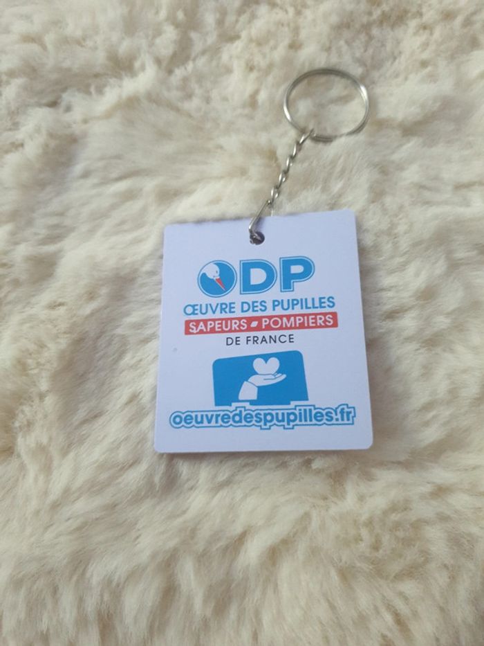Neuf porte clés sapeurs pompiers AG2R sponsor tour de France