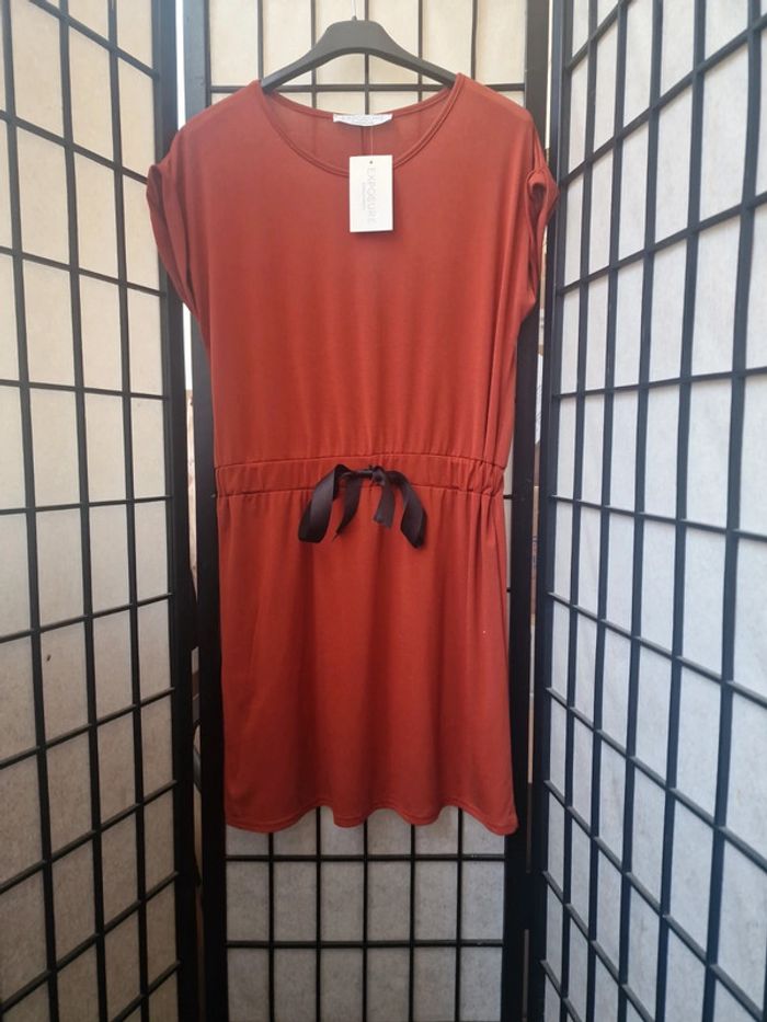 Robe neuve exposure