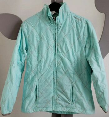 Coupe-vent bleu clair Quechua taille 8 ans