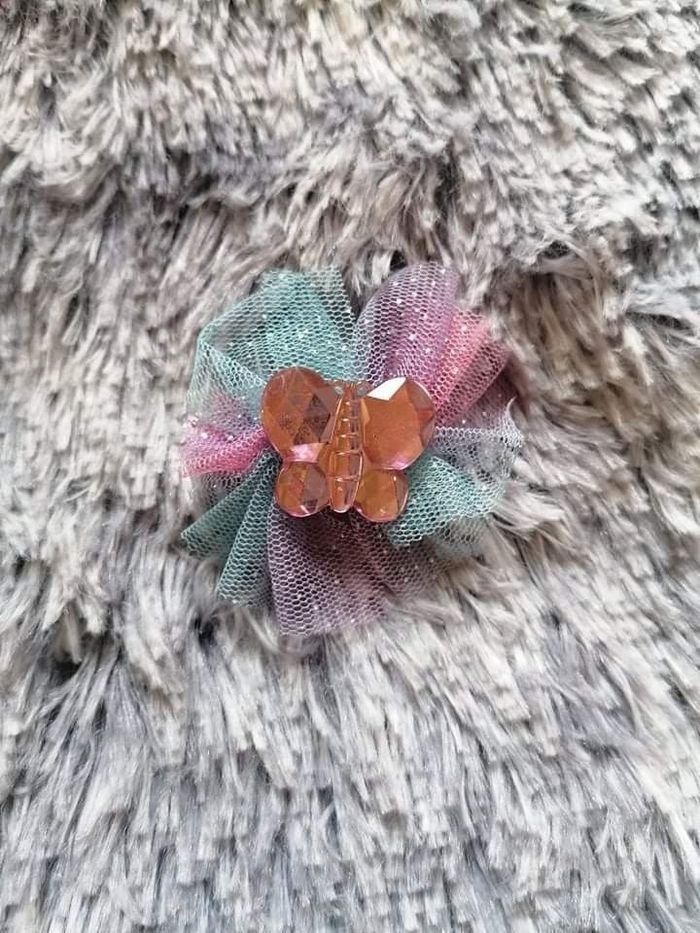 Pince papillon rose clair