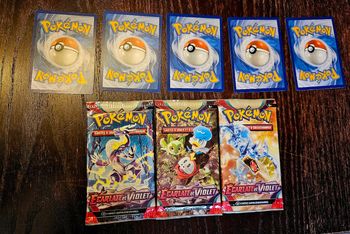 3 paquets de cartes pokemon