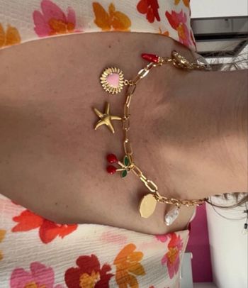 Collier à breloques doré 