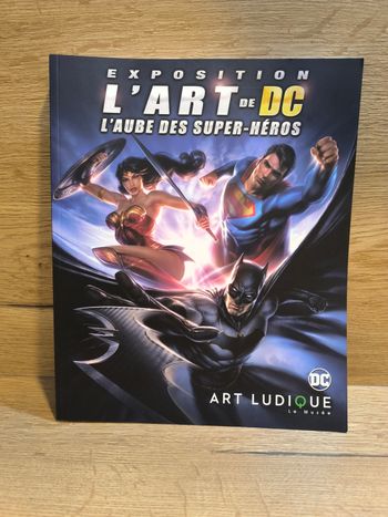 Livre l'art de dc l'aube des super-héros - art ludique neuf