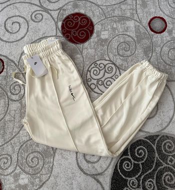 Pantalon jogging creme Nike