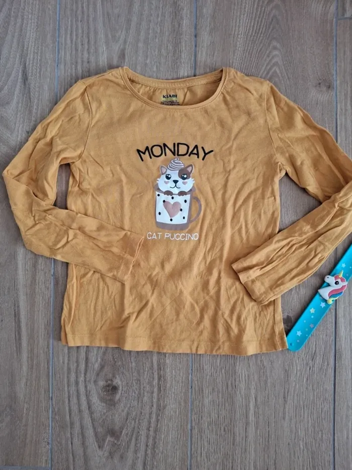 T-shirt manches longues Kiabi 6 ans très bon état