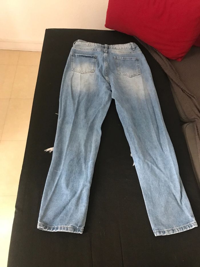 Jeans troués - photo numéro 2