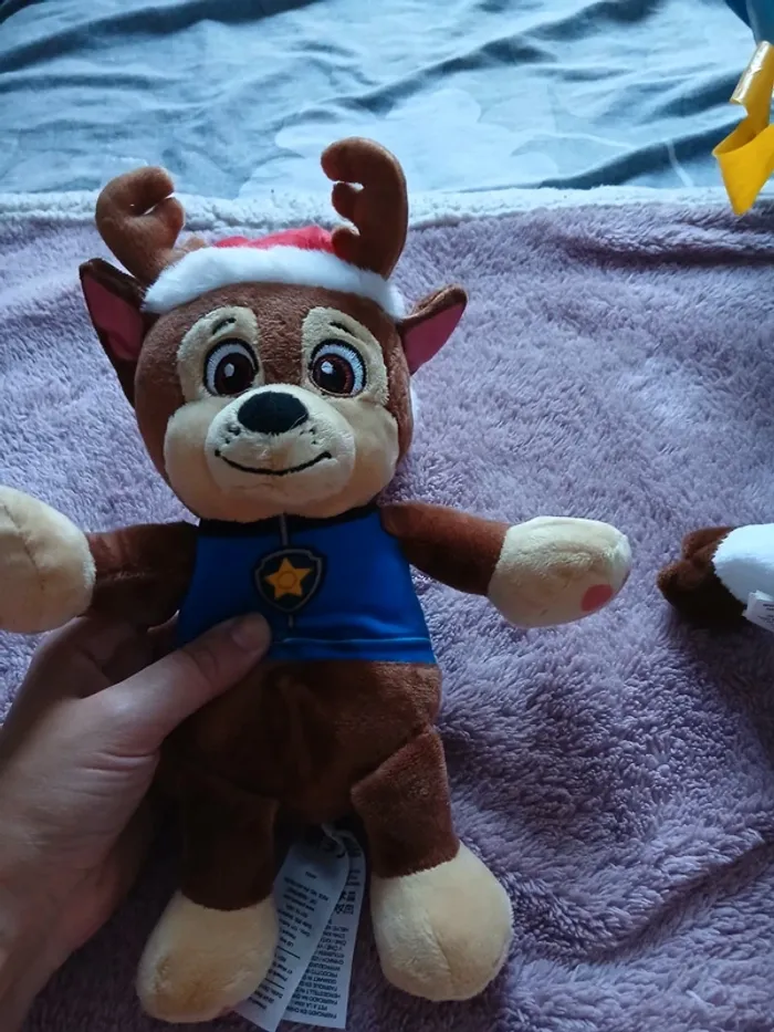 Peluche chase de noel
