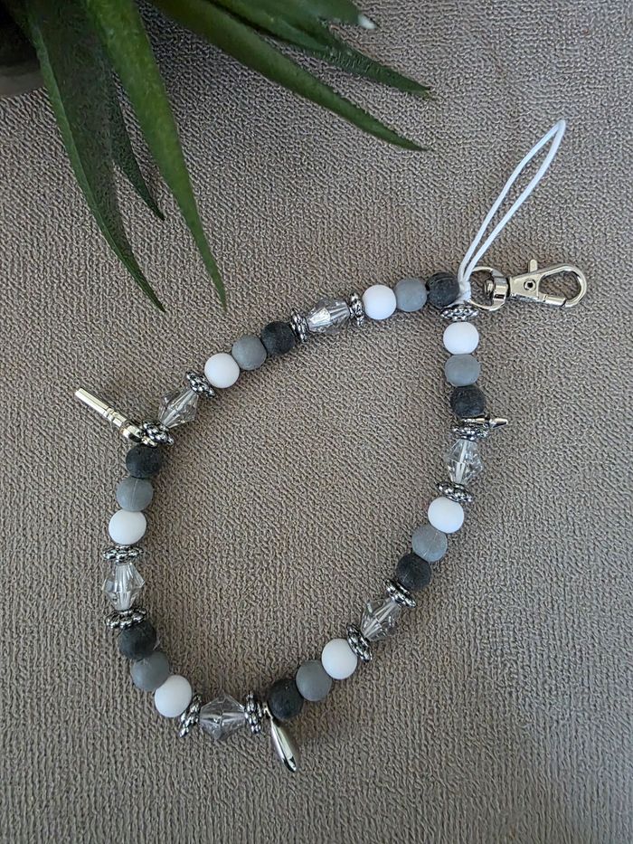 Lanière de telephone noire et grise neuve