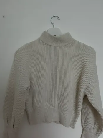Pull col montant