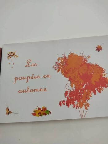 Album photos de poupées en automne