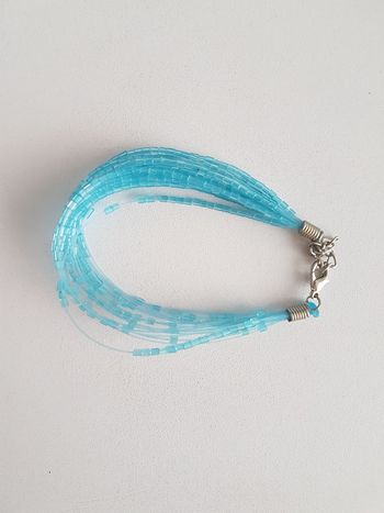 Bracelet perles bleues multirangs