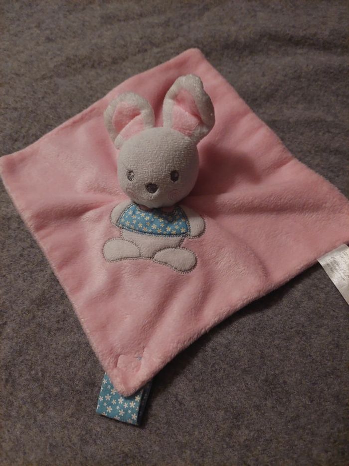Cartoon club - doudou lapin rose avec attache tetine