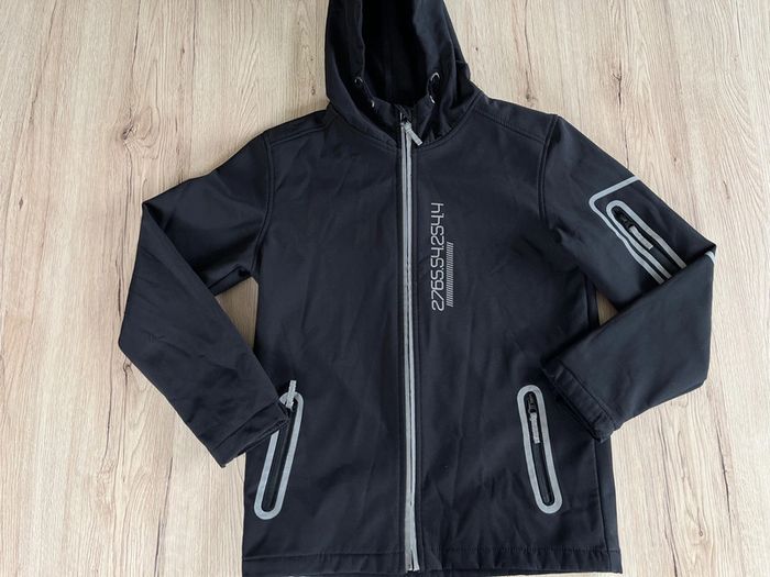 Veste imperméable polaire noir taille 12 ans