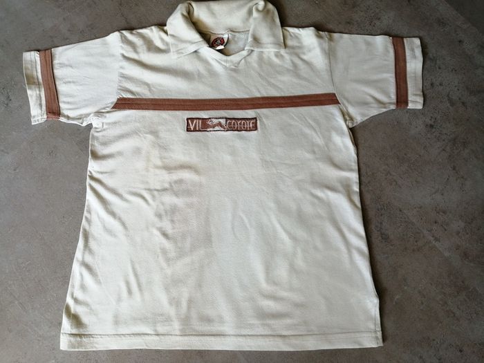 T-shirt avec col beige Vil coyote 8 ans Looney Tunes