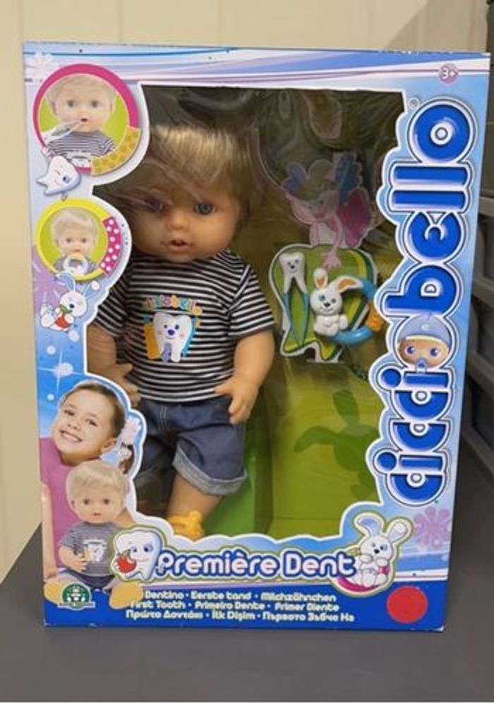 Poupon cicciobello première dent