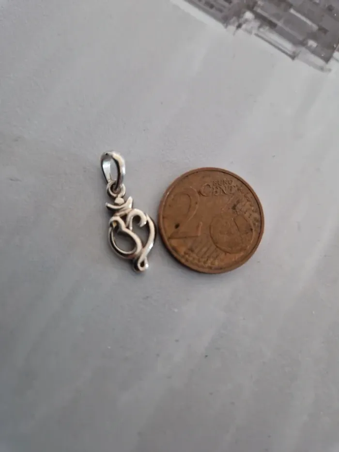Pendentif asiatique OM