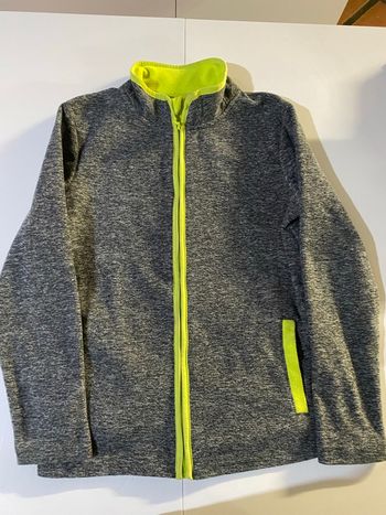 Veste polaire noir et jaune fluo tex taille 11/12 ans