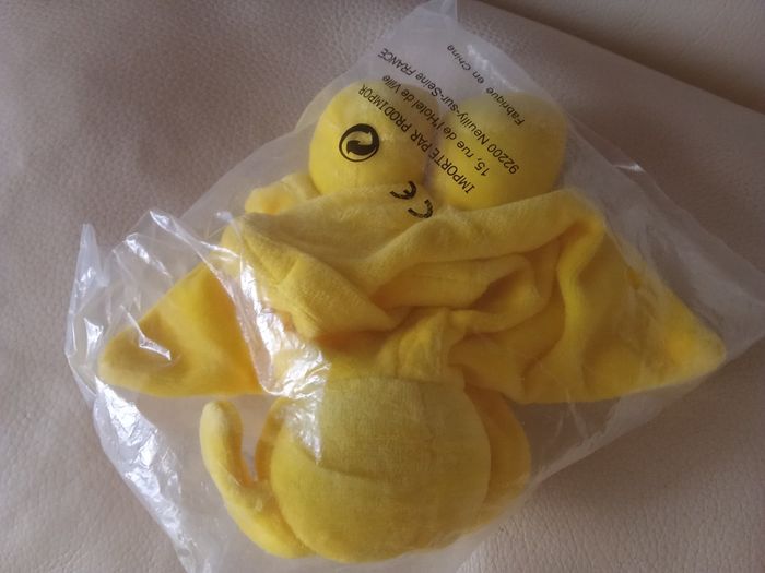 Chien  ou ours jaune  doudou Blédina  semi plat  vintage neuf  non ouvert - photo numéro 2