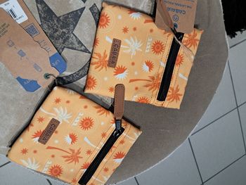 Pochette Cabaia latérale X2 palmiers corail