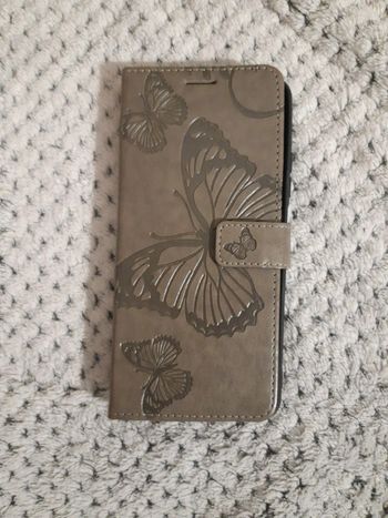 Housse de téléphone remi note 12,état neuf