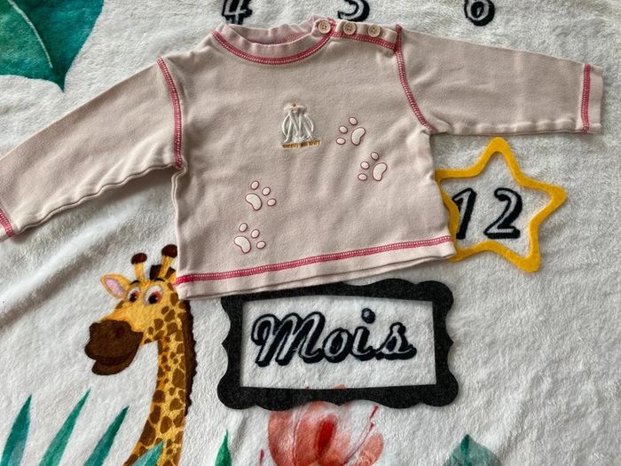 Pull OM 12 mois