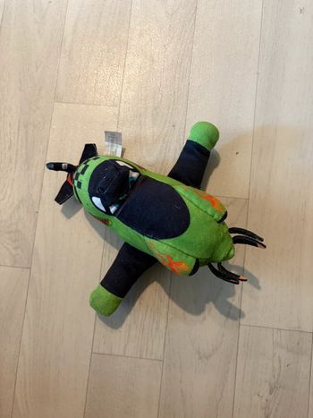 Peluche avion planes dusty verte et noire très bon état