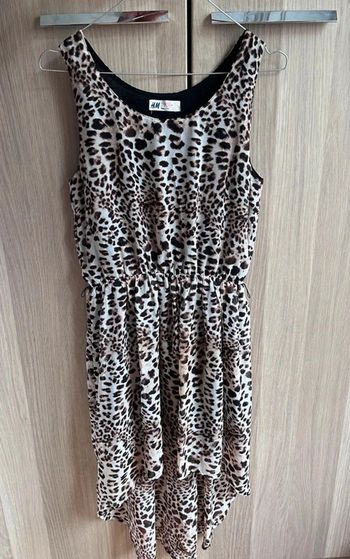 Neuve: magnifique robe Léopard taille 14 ans +