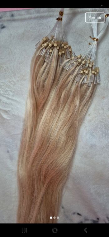 Extension cheveux naturels anneaux blond mècher