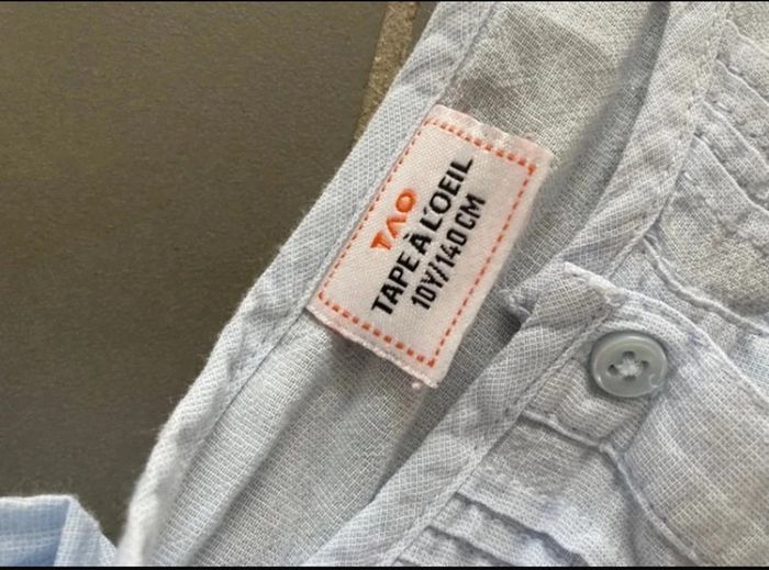 Chemise tape à l’oeil en très bon état 10 ans - photo numéro 2