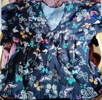 Belle blouse papillon