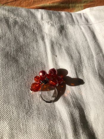 Bague pampilles oranges très bon état