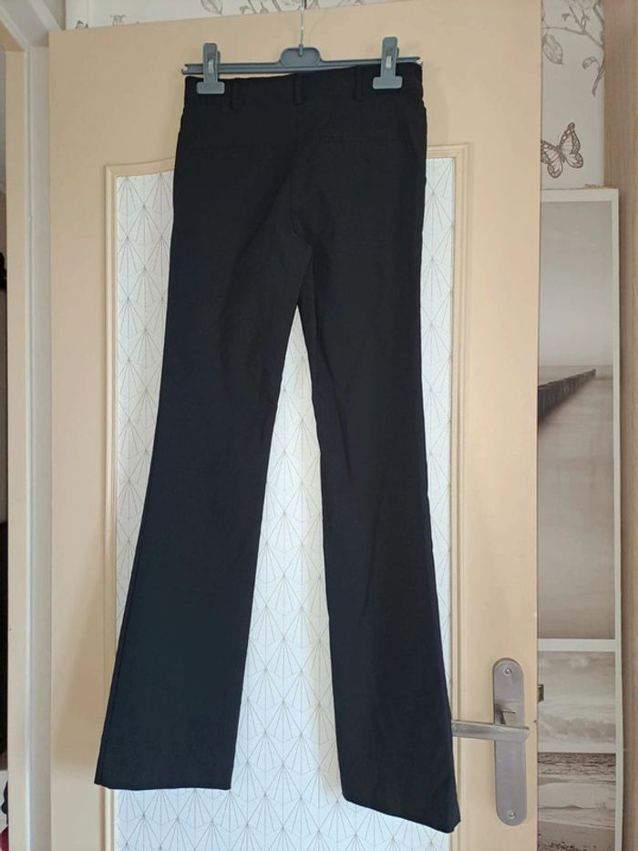Pantalon femme noir mosquitos 36 comme neuf coupe évasée un peu en bas - photo numéro 2