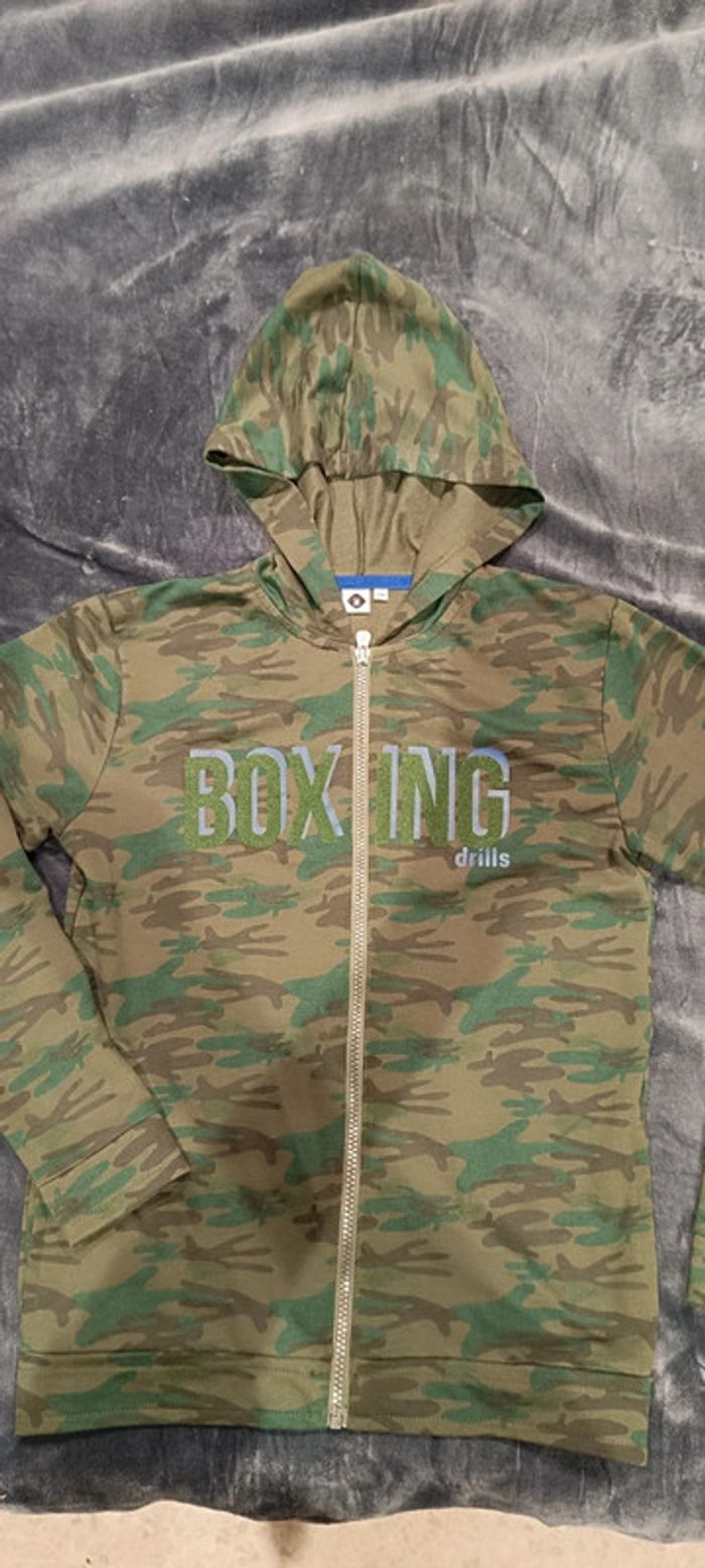 Veste 12 ans excellent état