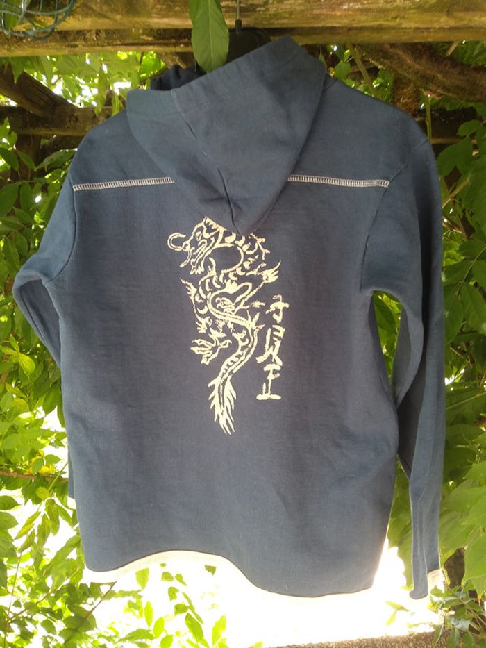 Joli sweat taille 12/14 ans