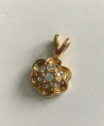 pendentif fantaisie métal doré et strass fleur