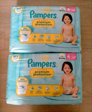 Lot couches Pampers premium taille 4