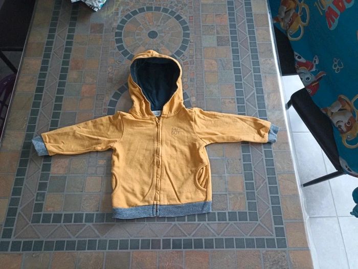Gilet à capuche