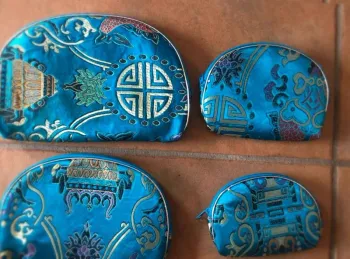 4  pochettes de Chine neuves