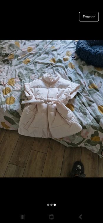 Vends doudoune sans manches