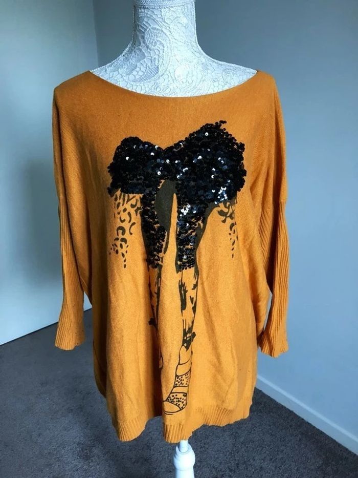 pull long taille unique, parfait état