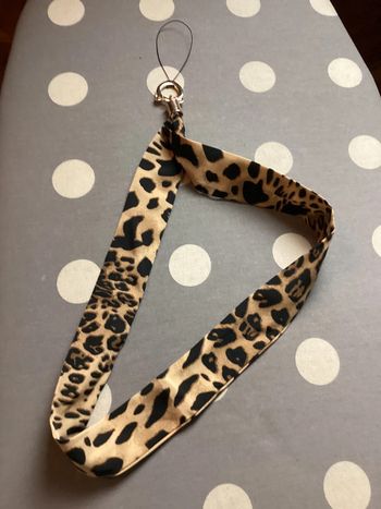 Accessoire de sac ou portable beige en noir