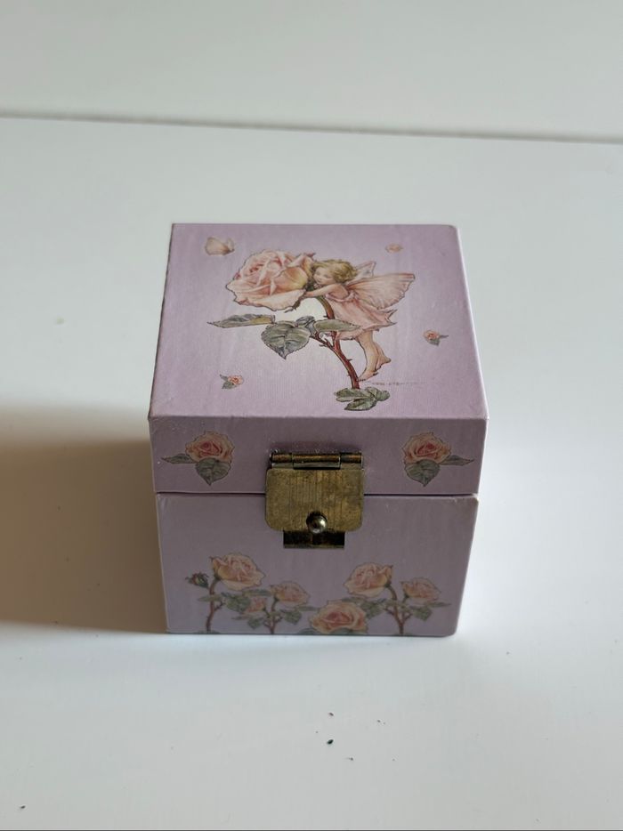Boîte à dents en bois violet pastel à motifs floraux