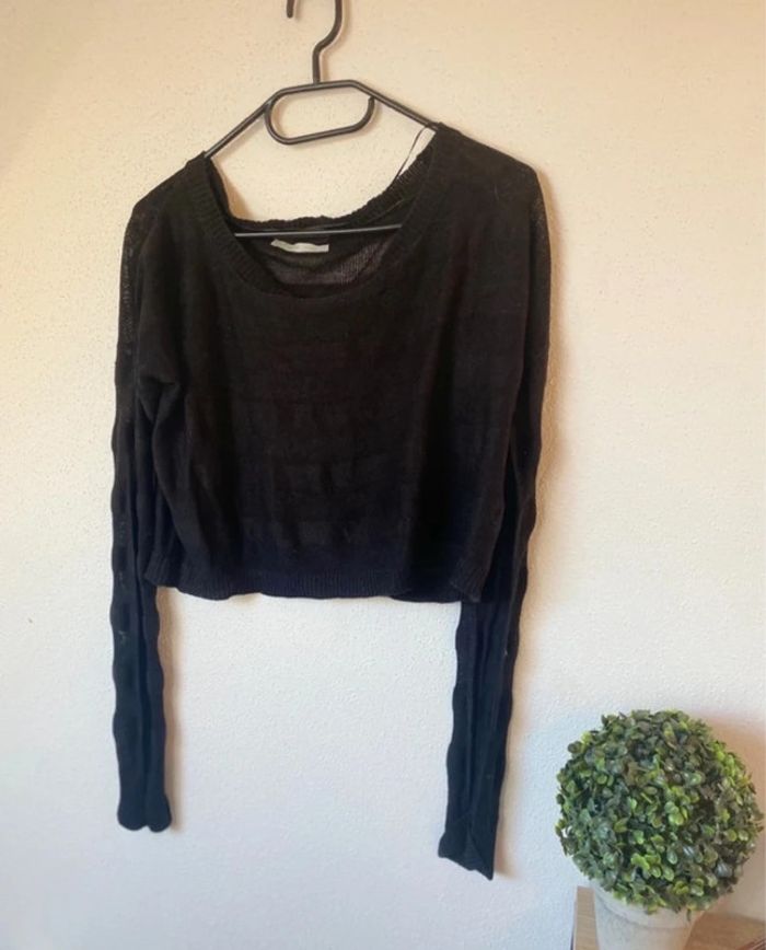 Pull noir ajouré  (taille L)