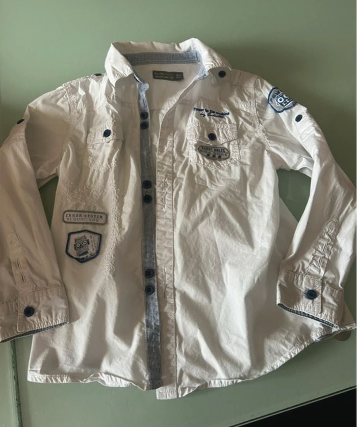 Très jolie chemise manches longues 10 ans orchestra