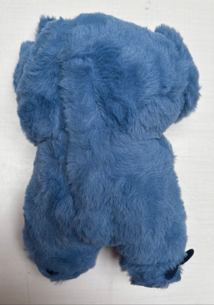 Peluche Stitch 28 cm lumineuse, respire,fait musique, les oreilles bougent 4 modes NEUF - photo numéro 2