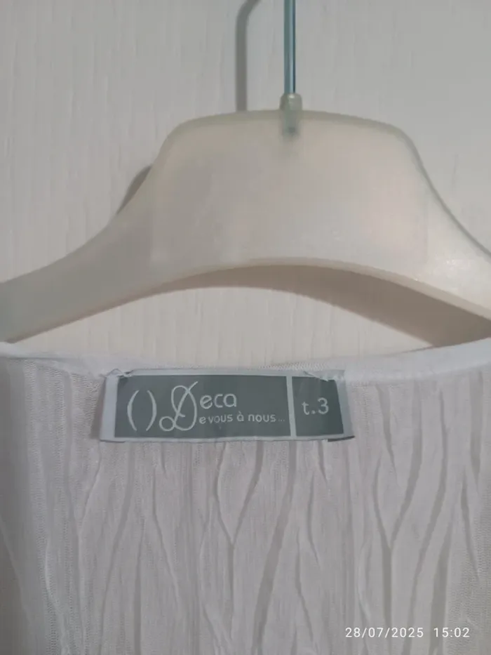 Haut blanc matière transparente - photo numéro 3