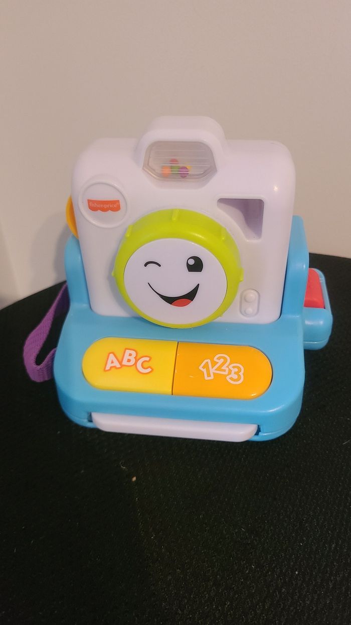 Fisher-Price Rires et Éveil Mon Premier Appareil Photo instantané, Jouet Musical - photo numéro 3