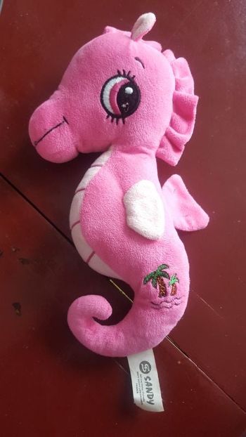 Peluche hippocampe rose très bon état.
