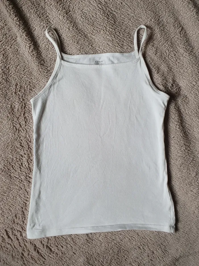 Débardeur blanc Kiabi taille 10 ans