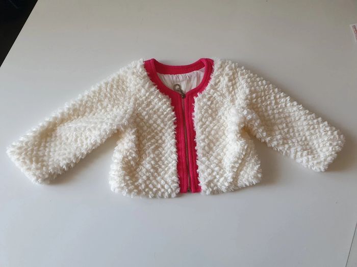 Veste en fourrure Neuf 18 mois